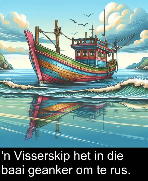 geanker: 'n Visserskip het in die baai geanker om te rus.