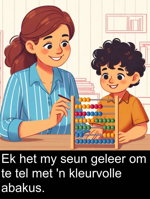 geleer: Ek het my seun geleer om te tel met 'n kleurvolle abakus.