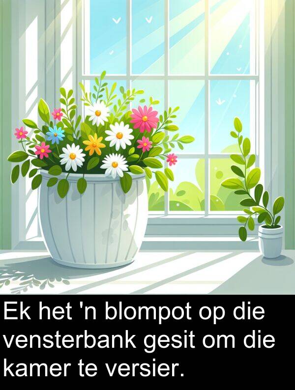 vensterbank: Ek het 'n blompot op die vensterbank gesit om die kamer te versier.