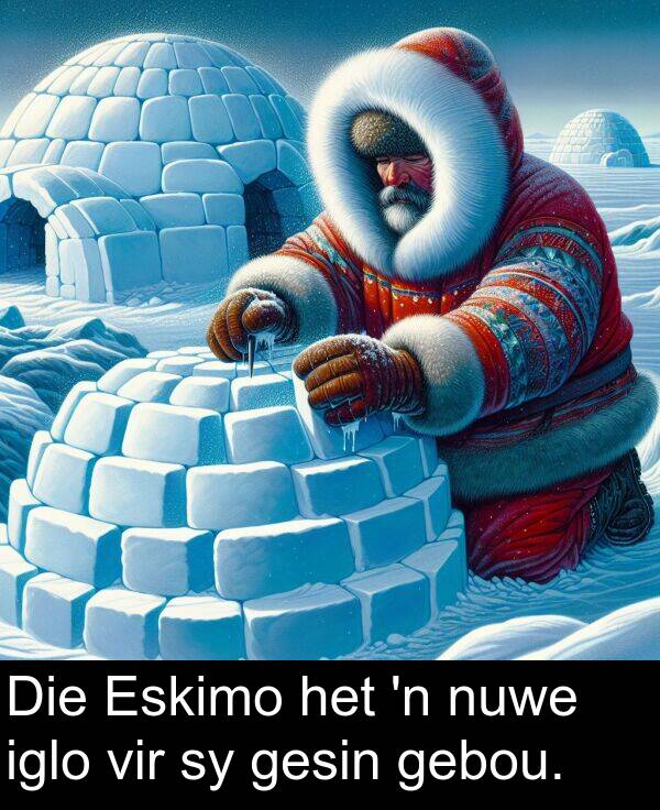 iglo: Die Eskimo het 'n nuwe iglo vir sy gesin gebou.
