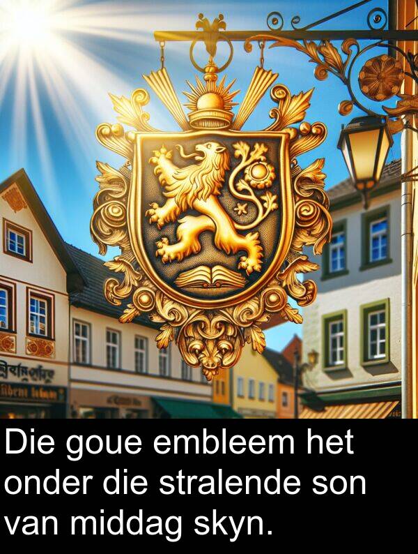 onder: Die goue embleem het onder die stralende son van middag skyn.