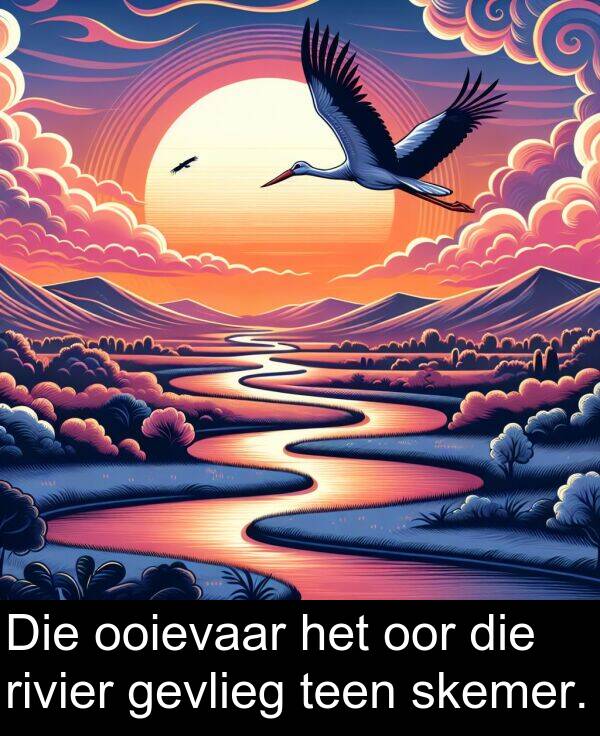 ooievaar: Die ooievaar het oor die rivier gevlieg teen skemer.