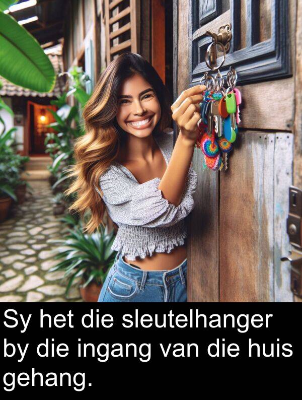 ingang: Sy het die sleutelhanger by die ingang van die huis gehang.