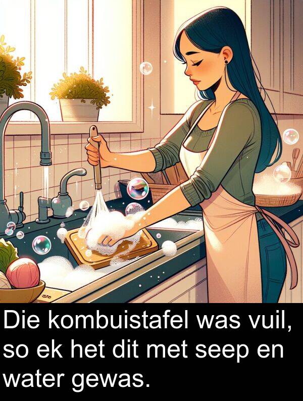 seep: Die kombuistafel was vuil, so ek het dit met seep en water gewas.