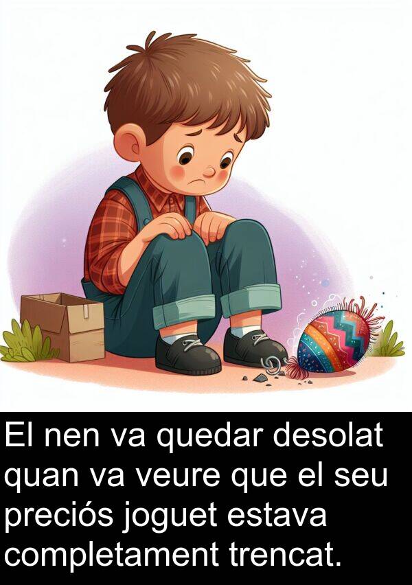 trencat: El nen va quedar desolat quan va veure que el seu preciós joguet estava completament trencat.