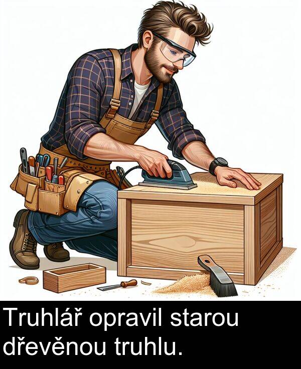 starou: Truhlář opravil starou dřevěnou truhlu.