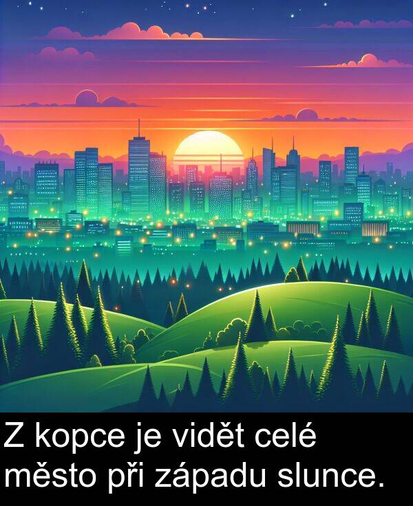 celé: Z kopce je vidět celé město při západu slunce.