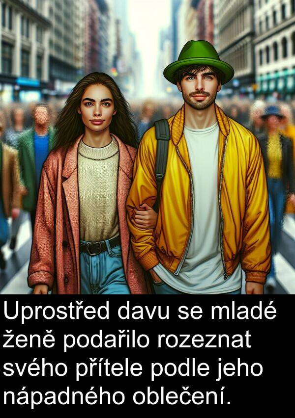 davu: Uprostřed davu se mladé ženě podařilo rozeznat svého přítele podle jeho nápadného oblečení.