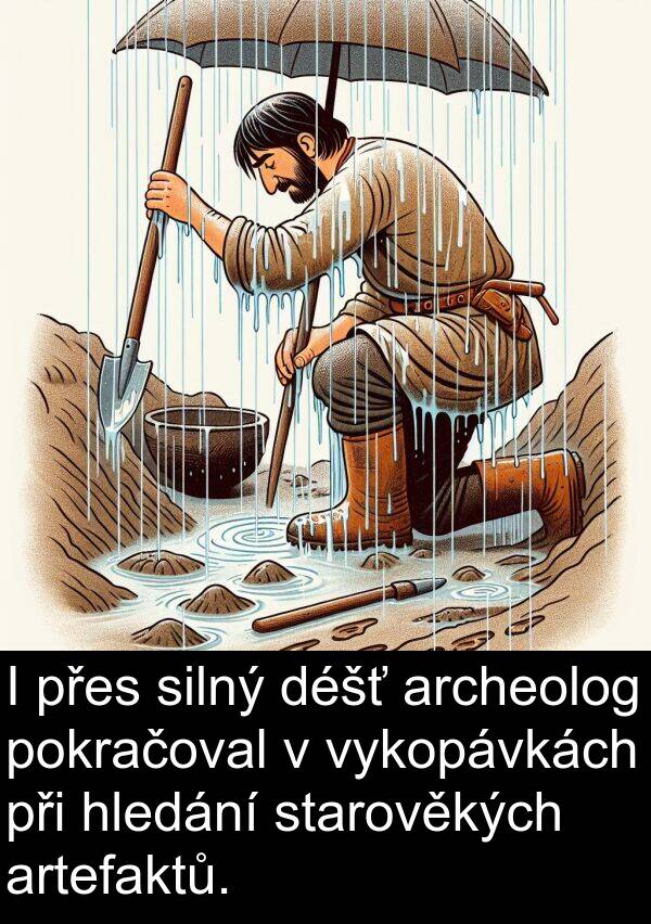 artefaktů: I přes silný déšť archeolog pokračoval v vykopávkách při hledání starověkých artefaktů.