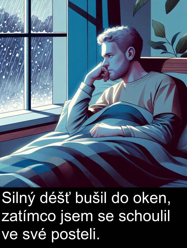 posteli: Silný déšť bušil do oken, zatímco jsem se schoulil ve své posteli.