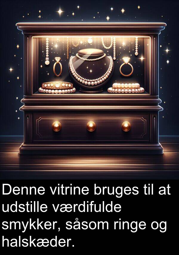 vitrine: Denne vitrine bruges til at udstille værdifulde smykker, såsom ringe og halskæder.
