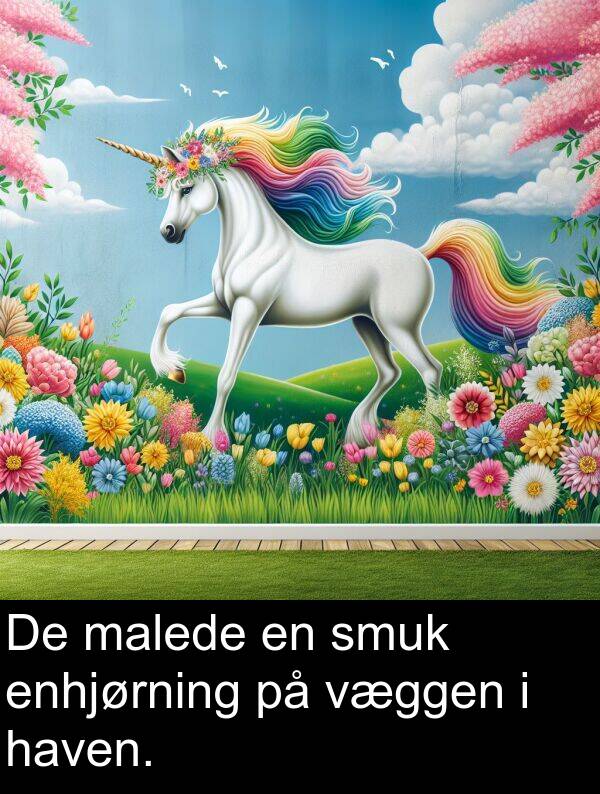 væggen: De malede en smuk enhjørning på væggen i haven.