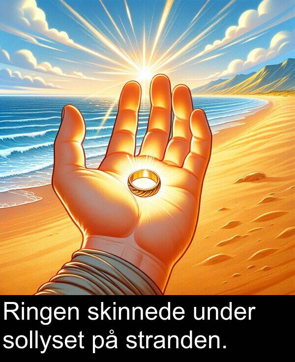 under: Ringen skinnede under sollyset på stranden.
