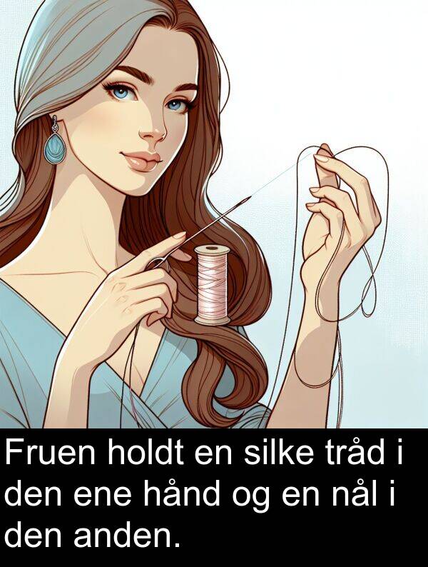 hånd: Fruen holdt en silke tråd i den ene hånd og en nål i den anden.