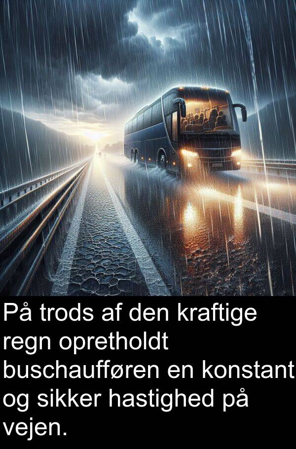 konstant: På trods af den kraftige regn opretholdt buschaufføren en konstant og sikker hastighed på vejen.