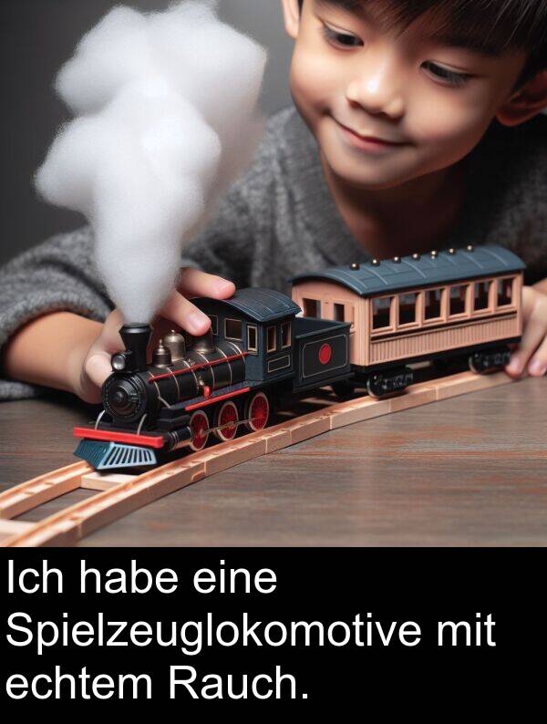 Rauch: Ich habe eine Spielzeuglokomotive mit echtem Rauch.