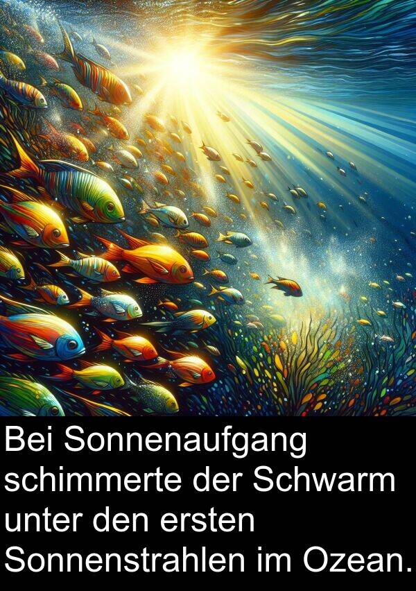 unter: Bei Sonnenaufgang schimmerte der Schwarm unter den ersten Sonnenstrahlen im Ozean.