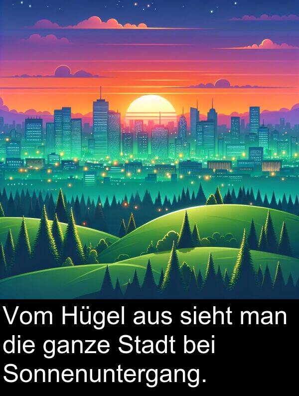 man: Vom Hügel aus sieht man die ganze Stadt bei Sonnenuntergang.