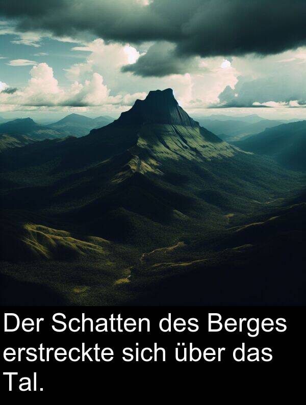Tal: Der Schatten des Berges erstreckte sich über das Tal.