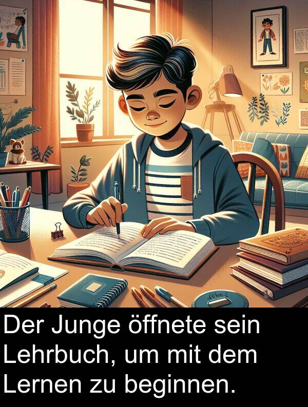 Lernen: Der Junge öffnete sein Lehrbuch, um mit dem Lernen zu beginnen.