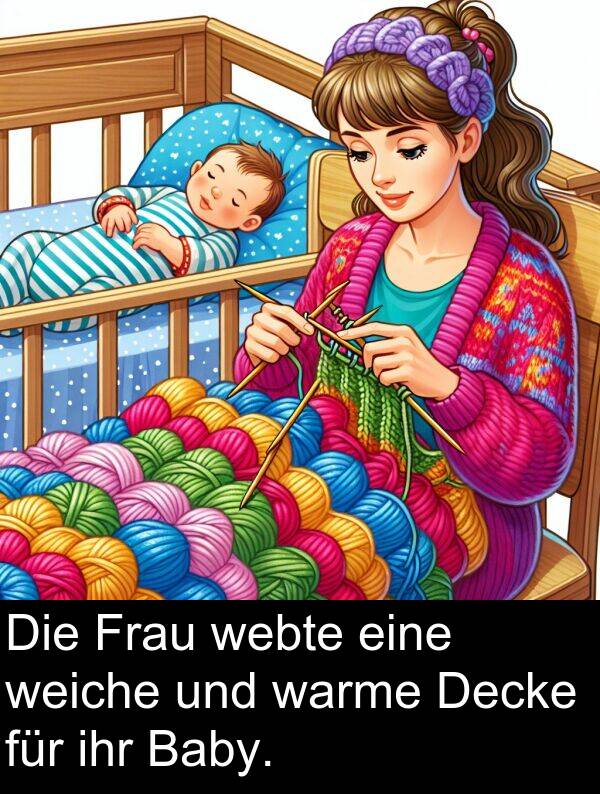 Decke: Die Frau webte eine weiche und warme Decke für ihr Baby.