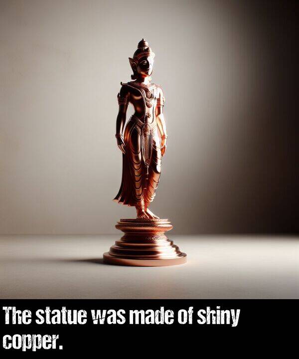 made: The statue was made of shiny copper.