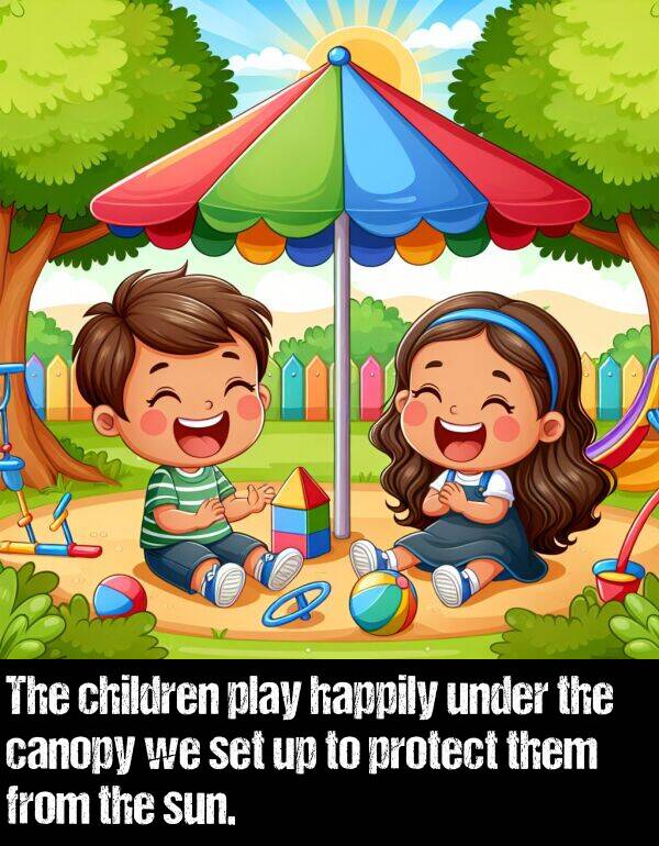 them: The children play happily under the canopy we set up to protect them from the sun.