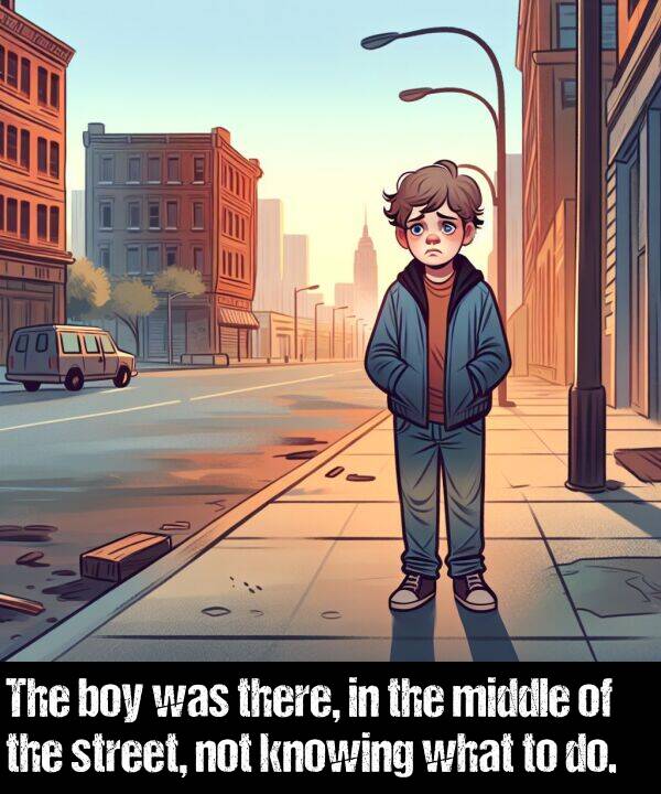 middle: The boy was there, in the middle of the street, not knowing what to do.