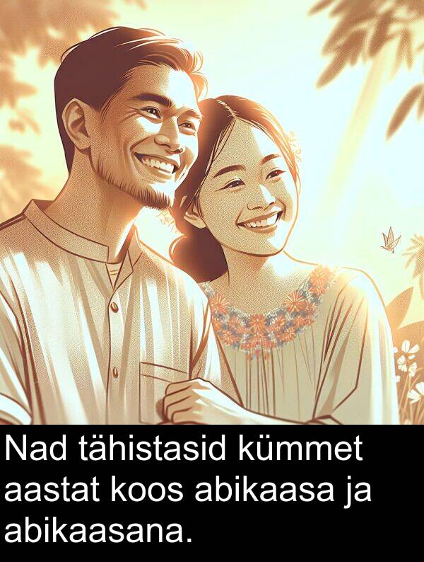 tähistasid: Nad tähistasid kümmet aastat koos abikaasa ja abikaasana.