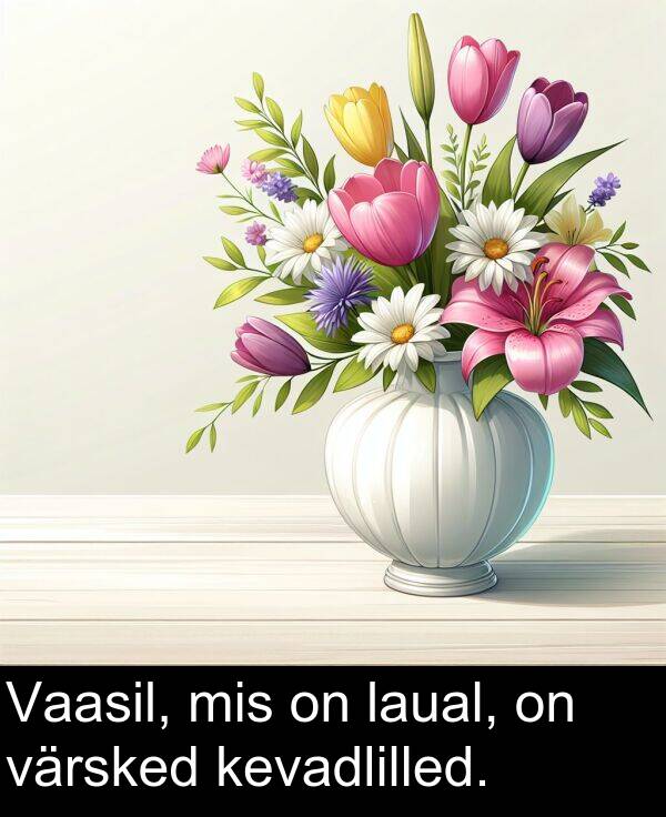 värsked: Vaasil, mis on laual, on värsked kevadlilled.