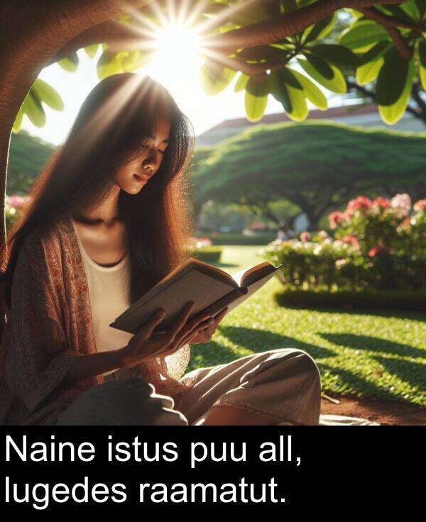 lugedes: Naine istus puu all, lugedes raamatut.