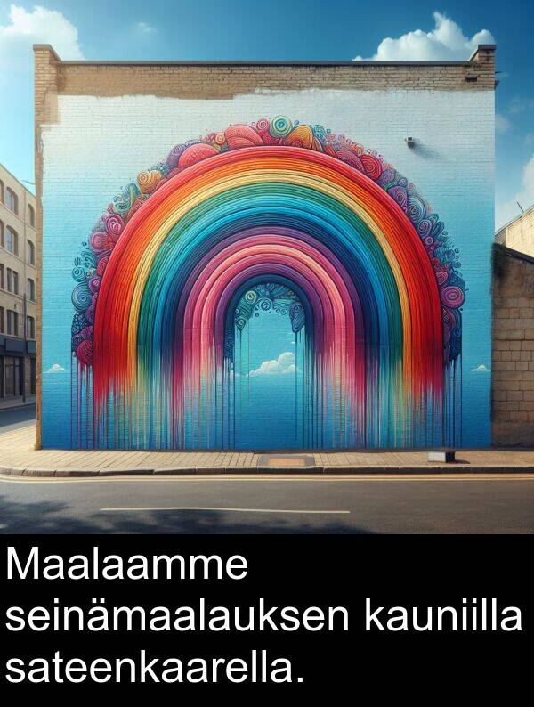 sateenkaarella: Maalaamme seinämaalauksen kauniilla sateenkaarella.