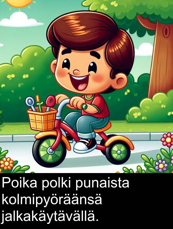jalkakäytävällä: Poika polki punaista kolmipyöräänsä jalkakäytävällä.