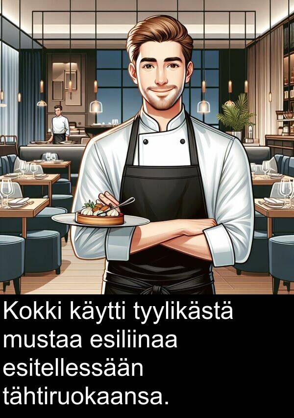 tähtiruokaansa: Kokki käytti tyylikästä mustaa esiliinaa esitellessään tähtiruokaansa.