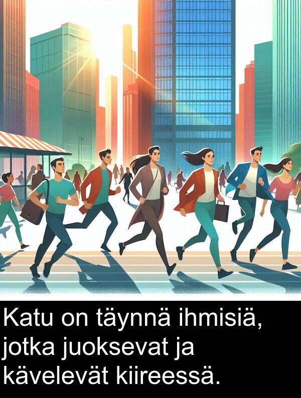 täynnä: Katu on täynnä ihmisiä, jotka juoksevat ja kävelevät kiireessä.