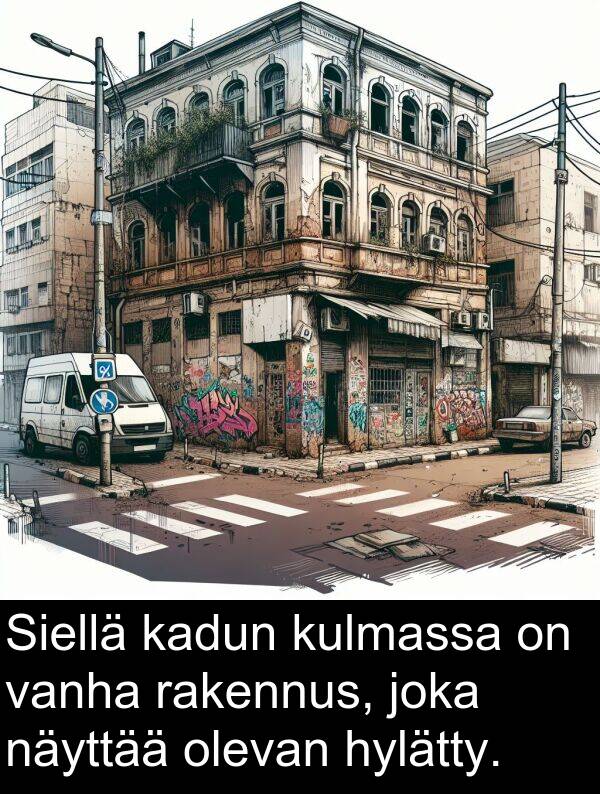 kadun: Siellä kadun kulmassa on vanha rakennus, joka näyttää olevan hylätty.