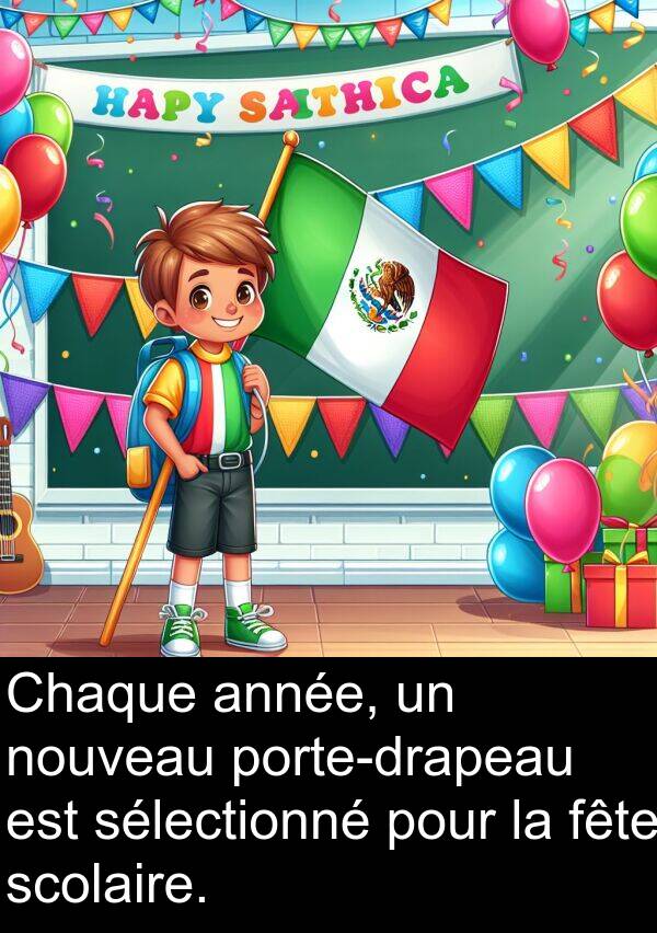 nouveau: Chaque année, un nouveau porte-drapeau est sélectionné pour la fête scolaire.