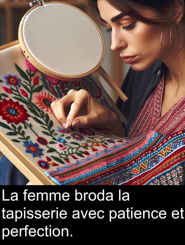 tapisserie: La femme broda la tapisserie avec patience et perfection.