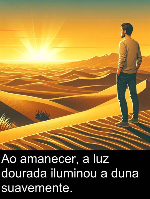amanecer: Ao amanecer, a luz dourada iluminou a duna suavemente.