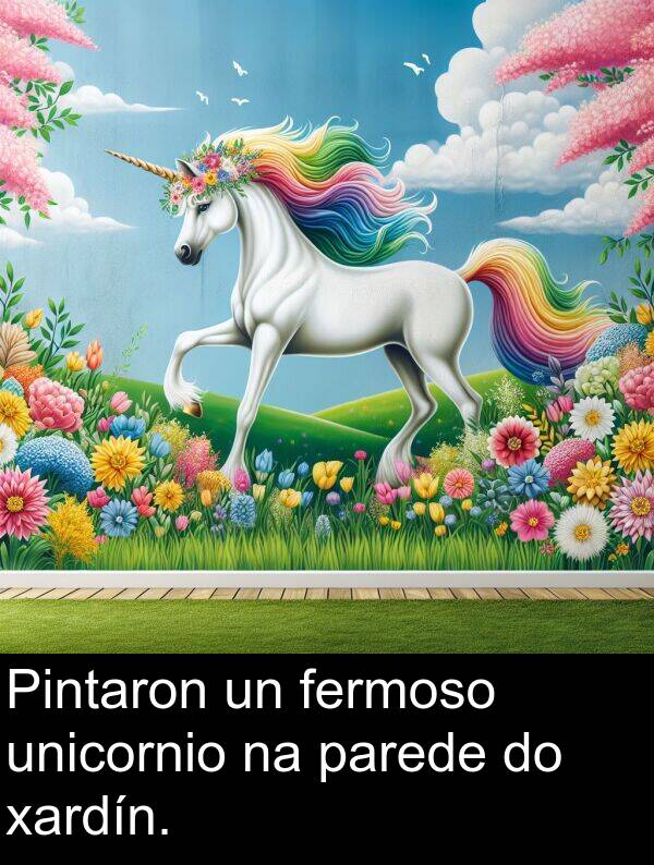 parede: Pintaron un fermoso unicornio na parede do xardín.