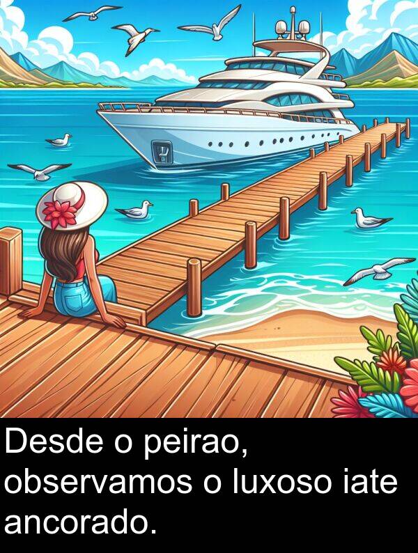 iate: Desde o peirao, observamos o luxoso iate ancorado.