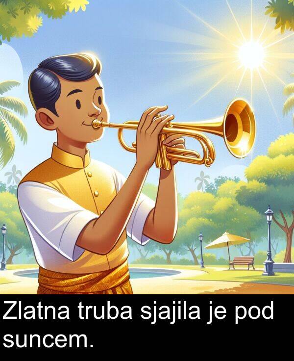 sjajila: Zlatna truba sjajila je pod suncem.