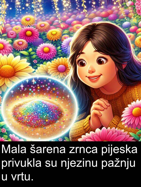 pažnju: Mala šarena zrnca pijeska privukla su njezinu pažnju u vrtu.