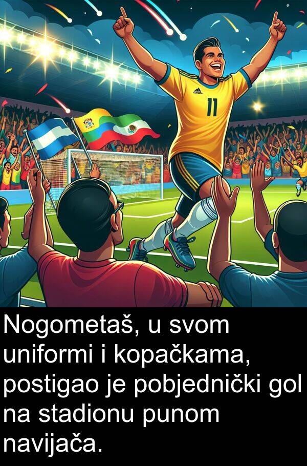 uniformi: Nogometaš, u svom uniformi i kopačkama, postigao je pobjednički gol na stadionu punom navijača.
