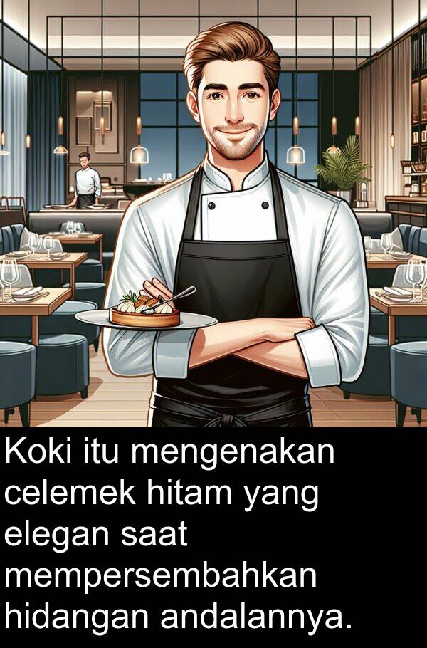 elegan: Koki itu mengenakan celemek hitam yang elegan saat mempersembahkan hidangan andalannya.