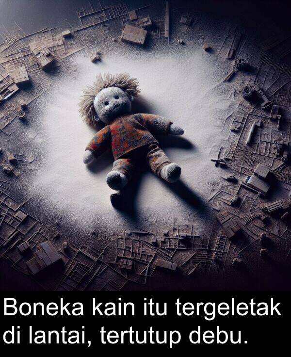 tergeletak: Boneka kain itu tergeletak di lantai, tertutup debu.