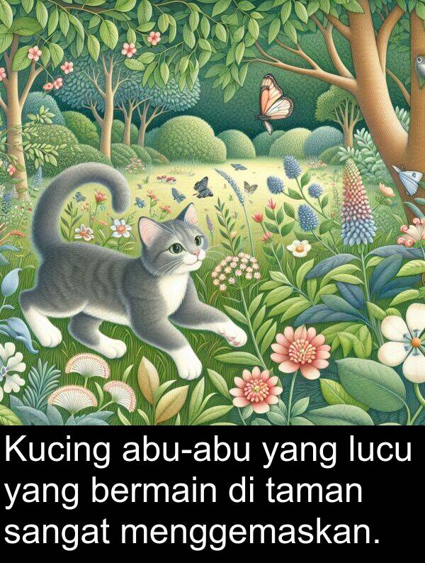 lucu: Kucing abu-abu yang lucu yang bermain di taman sangat menggemaskan.