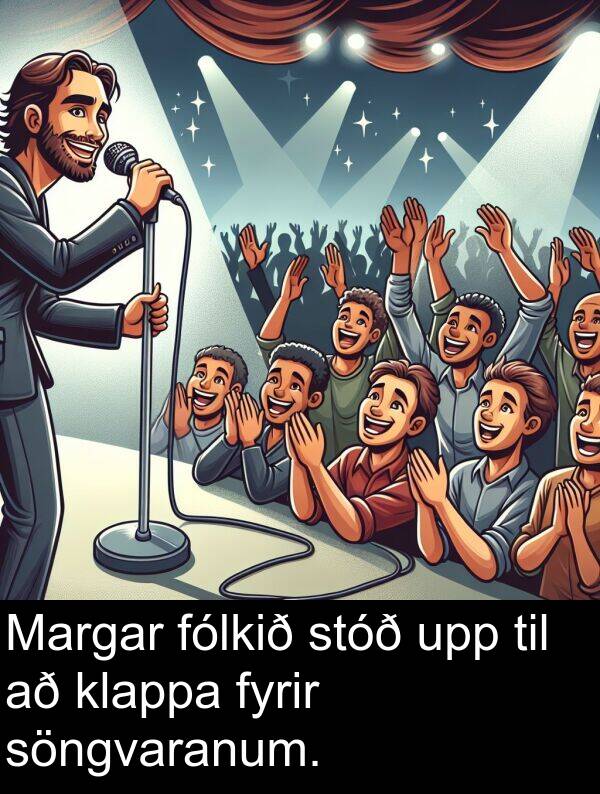 klappa: Margar fólkið stóð upp til að klappa fyrir söngvaranum.