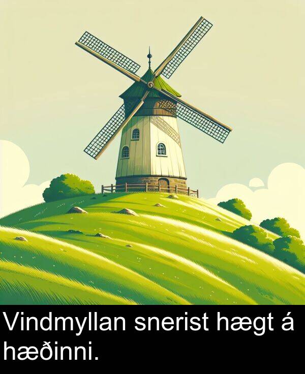 hæðinni: Vindmyllan snerist hægt á hæðinni.