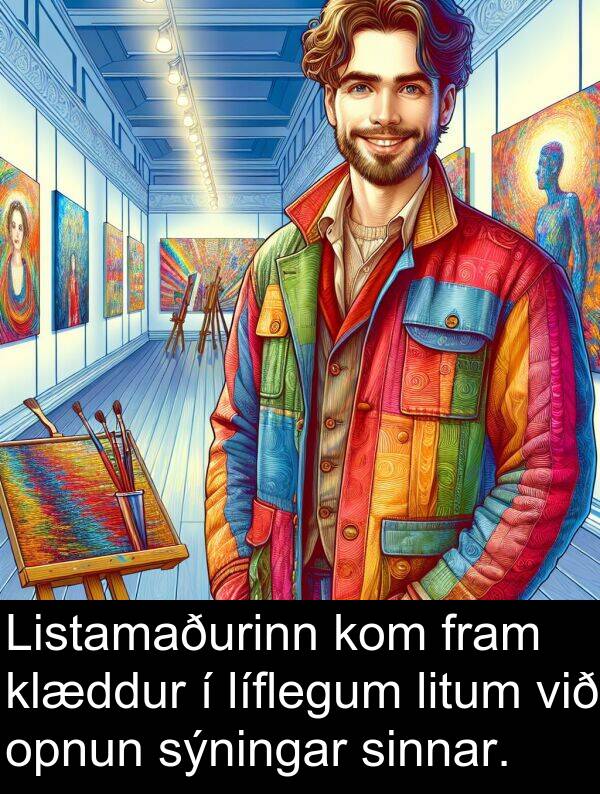 opnun: Listamaðurinn kom fram klæddur í líflegum litum við opnun sýningar sinnar.